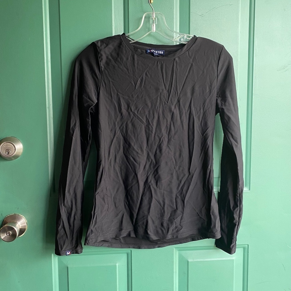 Ladies Movetes size small athletic top.